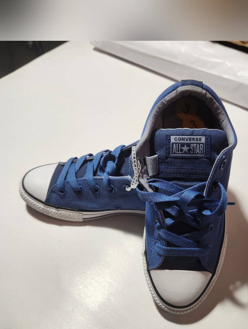Converse All Star Low Top Sneakers in Blue and White